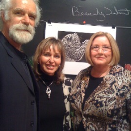 Dereck and Beverly Joubert with Leslee Hall of Botswana Tourism; at the launch of Beverly’s prints from ”Eye of the Leopard“, “Legadema’s Spot” in the background (Feb 2010, La Jolla, CA)
